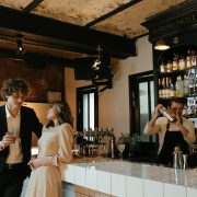 man and women talking in bar
